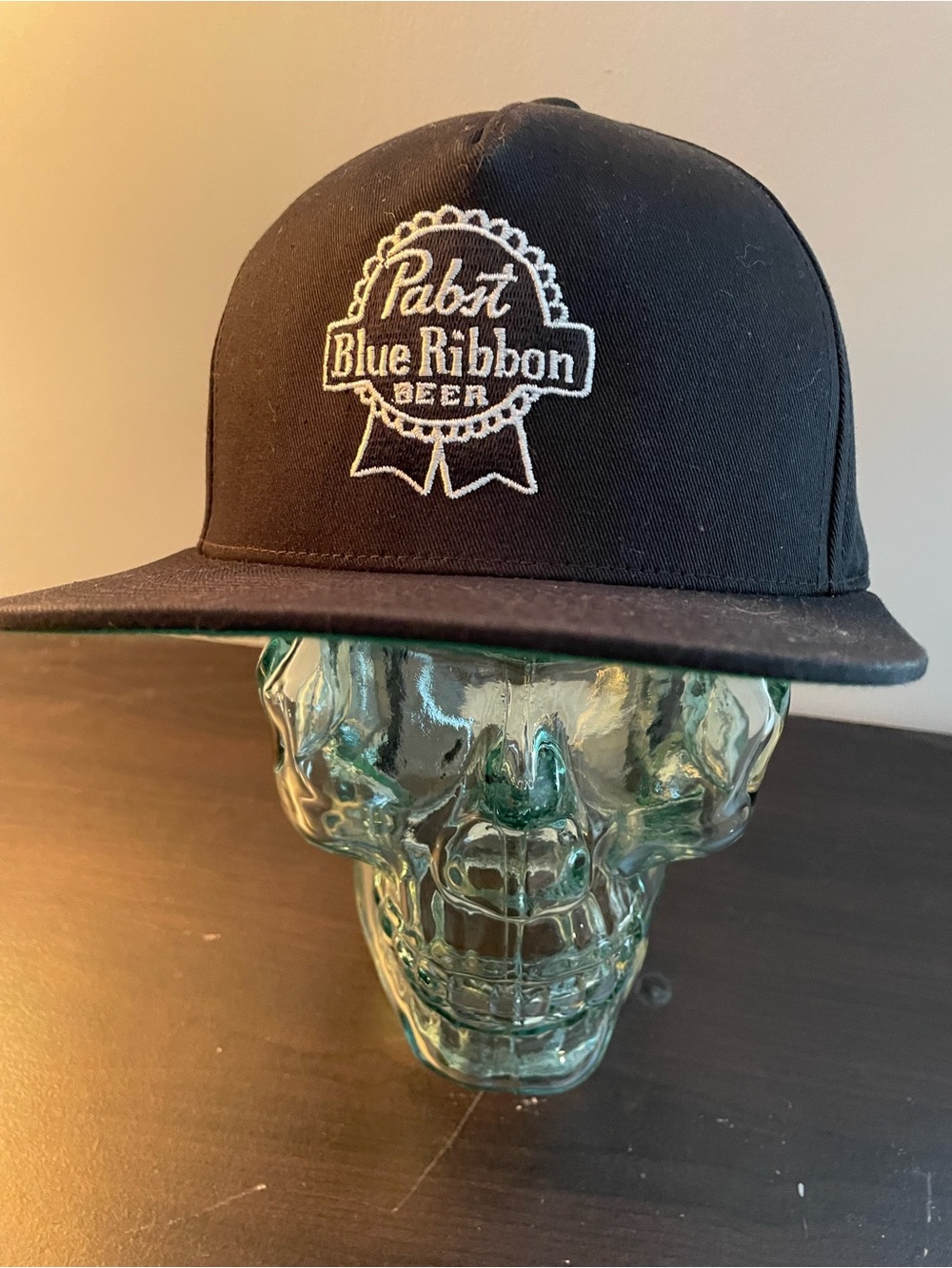 Classic Black Snapback Hat with White Embroidered Logo